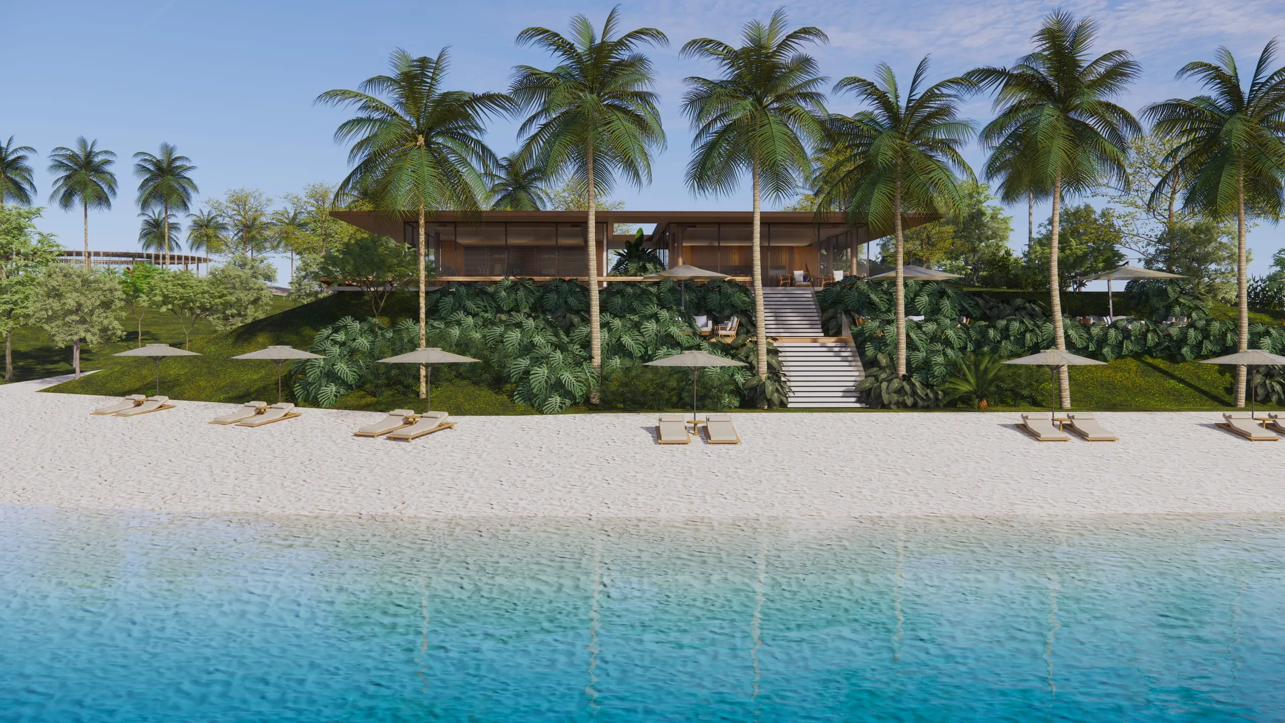 Praia artificial do beach club, com guarda-sóis à beira da lagoa